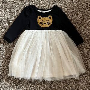 Extra sparkle for your kitty lover! Size 5T!